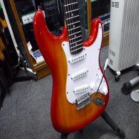 <p>Decent entry-level electric guitar with solid alder body, cherry sunburst finish, and great playability.</p><p>Excellent condition.</p>