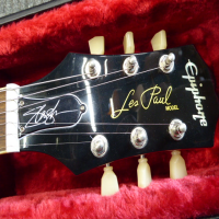 <p>Slash signature Les Paul by Epiphone.&nbsp; Includes hard case.</p><p>Condition: A couple of small dings in the top, otherwise excellent.</p>